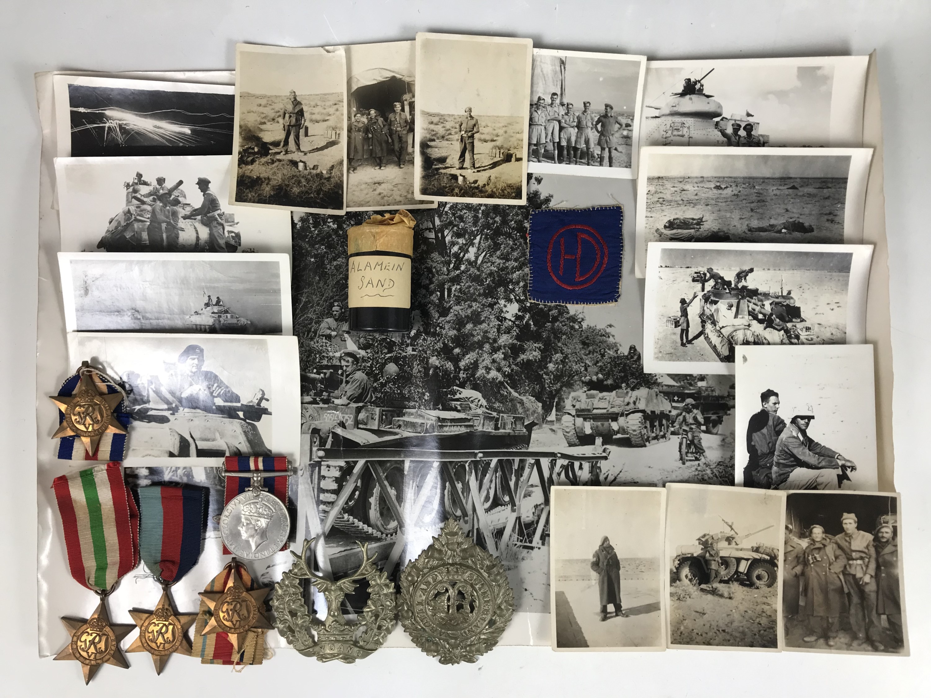 A Second World War campaign medal group, together with Highland Division formation sign, cap badges,