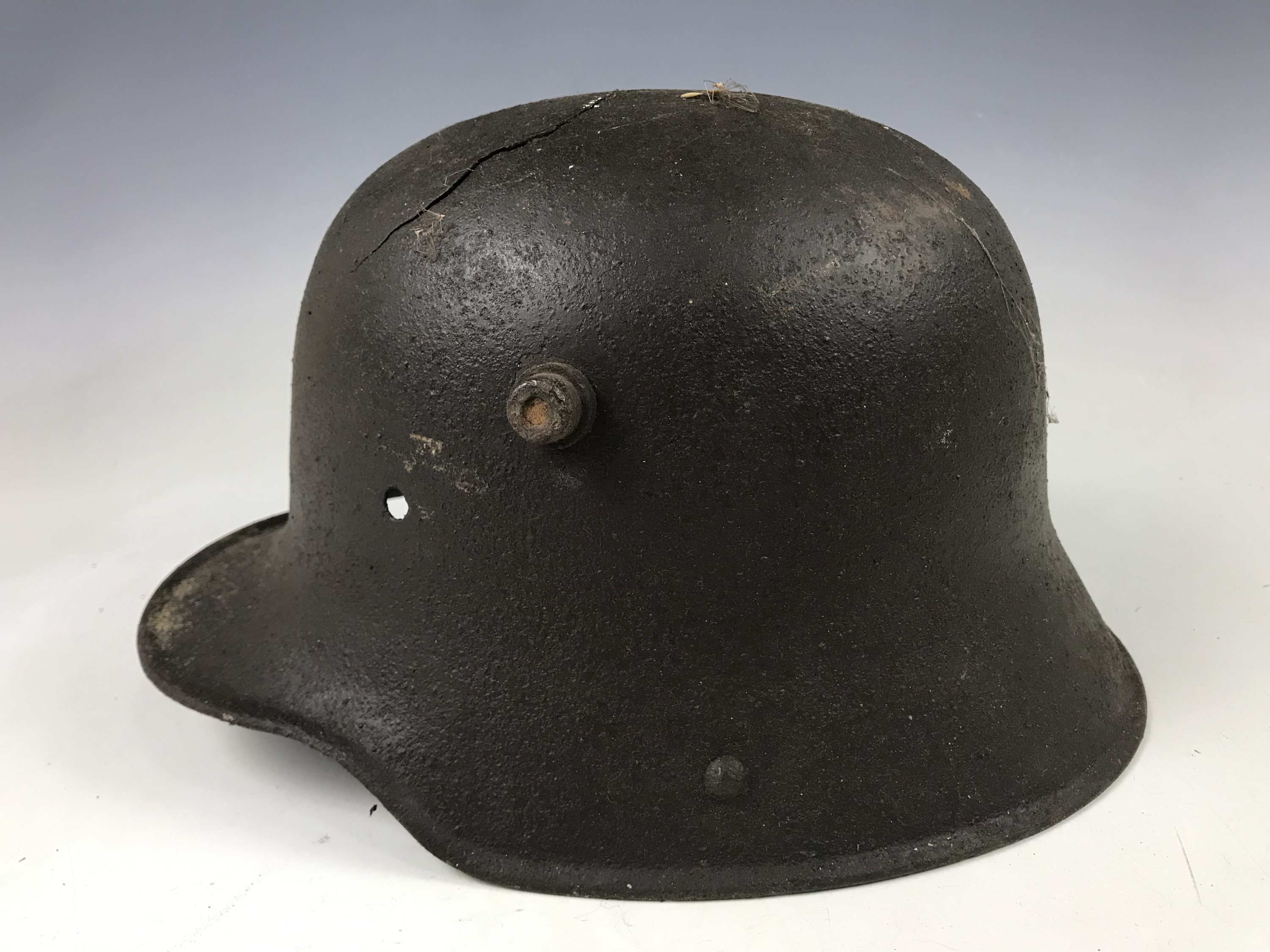 A relic Imperial German steel helmet exhibiting fractures - Image 3 of 5