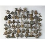 A quantity of infantry cap badges