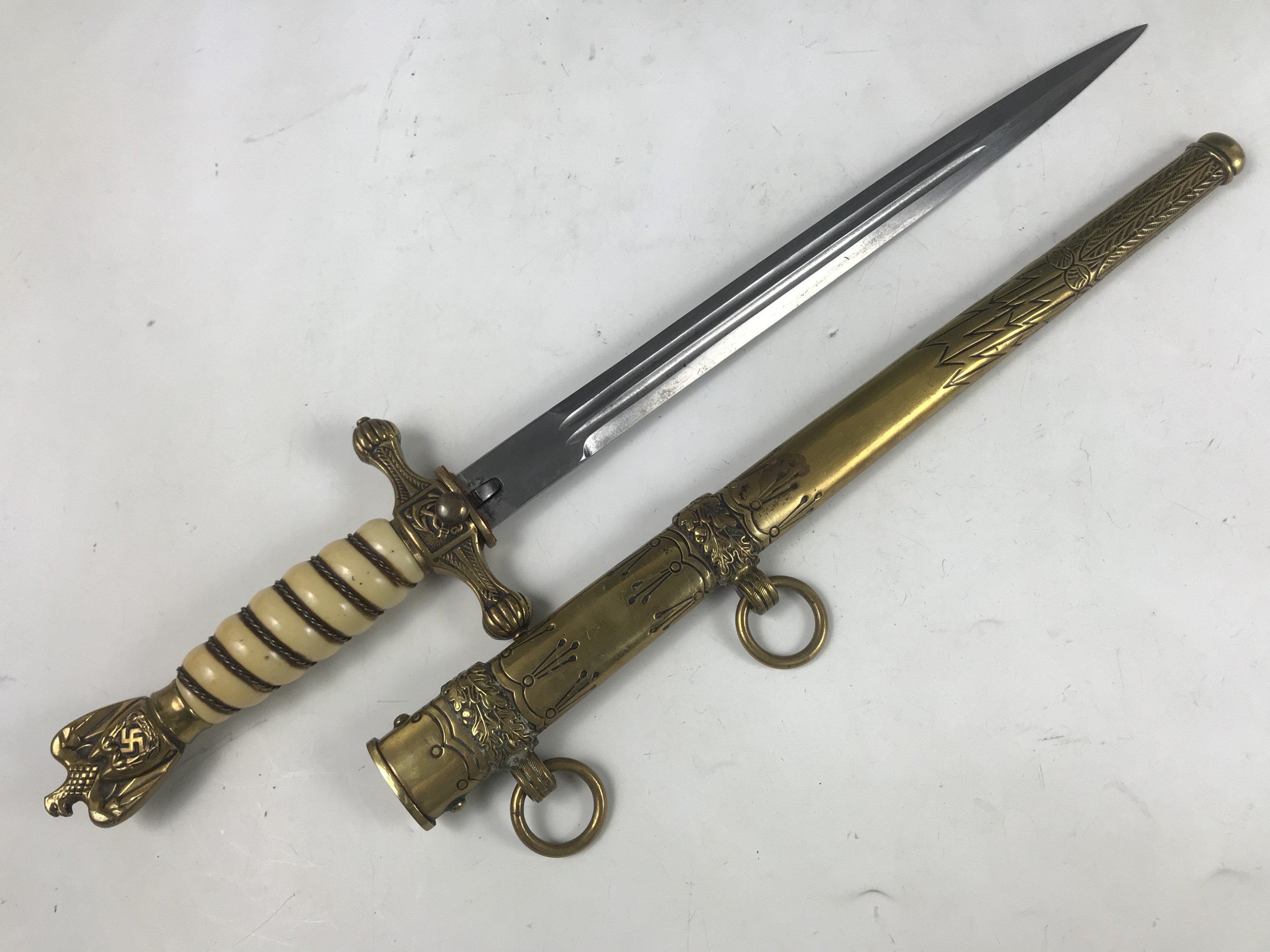 A German Third Reich Kriegsmarine NCOs dagger, having un-marked and non-decorated blade