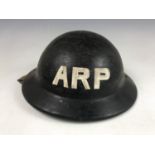 A Second World War Civil Defense ARP Plasfort helmet