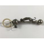 An early Edwardian silver baby's rattle and teether incorporating an automaton monkey, Chrisford &