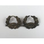 A pair of Victorian 57th Regiment of Foot / Middlesex Regiment collar badges