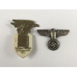A German Third Reich cap eagle badge (a/f) and a 1939 day badge
