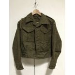 A 52nd Battalion Kent Home Guard officer's Battledress blouse, trousers and greatcoat