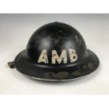 A Second World War Civil Defense Ambulance helmet