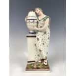 An early 19th Century Staffordshire pearlware figure of Andromache weeping over the ashes of Hector,