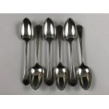 A set of six Victorian silver bead pattern teaspoons, having tapering terminals engraved with the