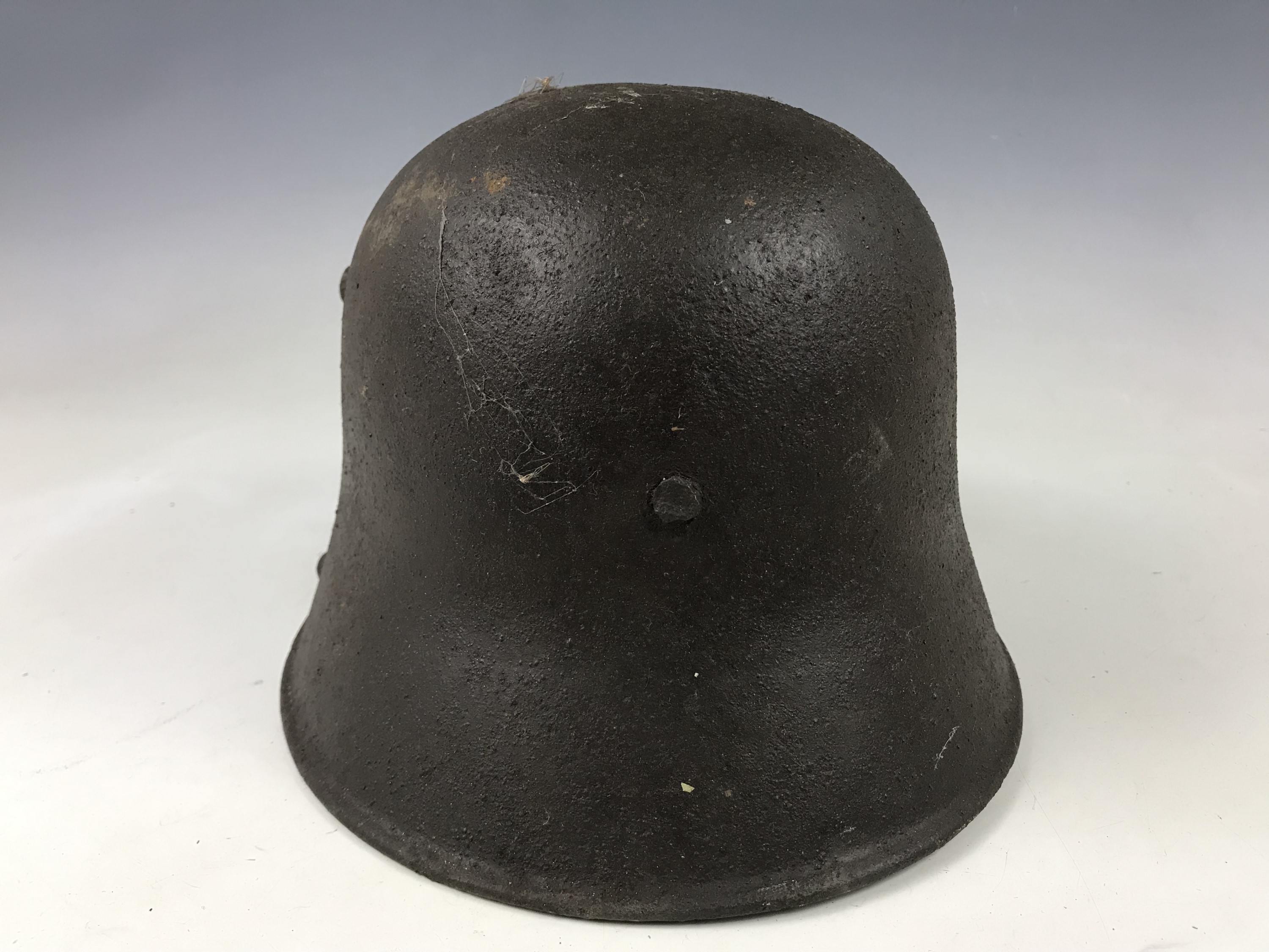 A relic Imperial German steel helmet exhibiting fractures - Image 4 of 5