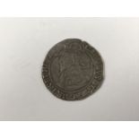 A Charles I hammered silver shilling coin, mint mark Harp (1632-3)