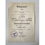 A German Third Reich award document for the silver wound badge to a soldier of the Leibstandarte SS