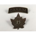 A Canadian 71st Overseas Battalion bronze badge and a shoulder title