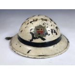 A Second World War Civil Defense Fire Brigade helmet