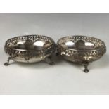 A pair of George V silver bon-bon dishes, of shallow oblate form, having lobed, cusped and