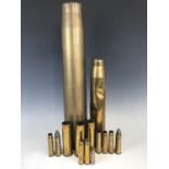 A number of rounds, brass cartridge and shell cases including 1941 3.7-inch, 1943 6-pounder and