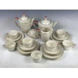 A Rosenthal Ivory Art Deco porcelain tea service for six, of tapering cylindrical and stacked