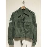 A 1940s British Army jungle green Battledress blouse