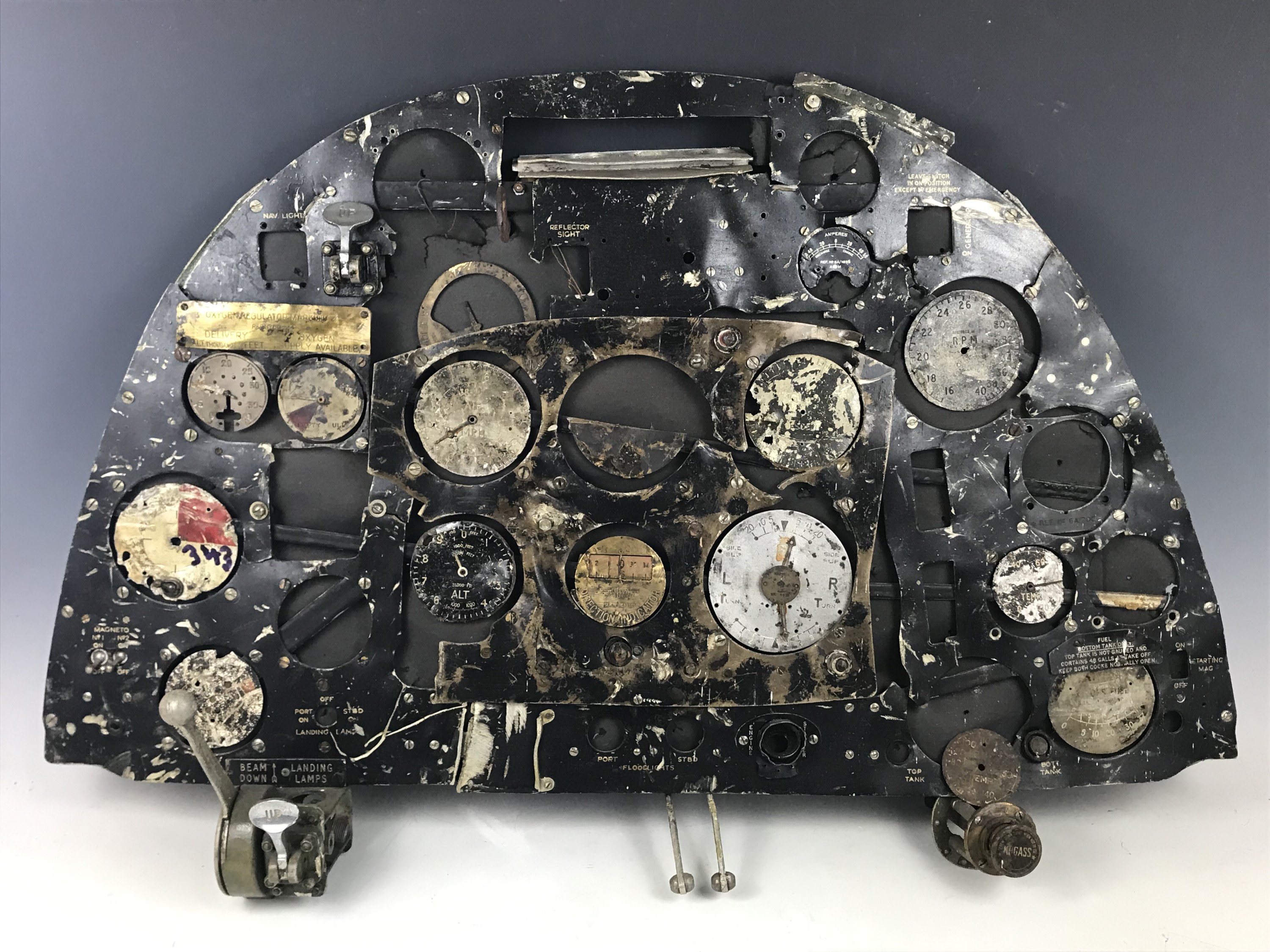 A relic RAF Spitfire cockpit instrument panel with provenance