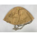 An RAF survival vest yellow cotton cap
