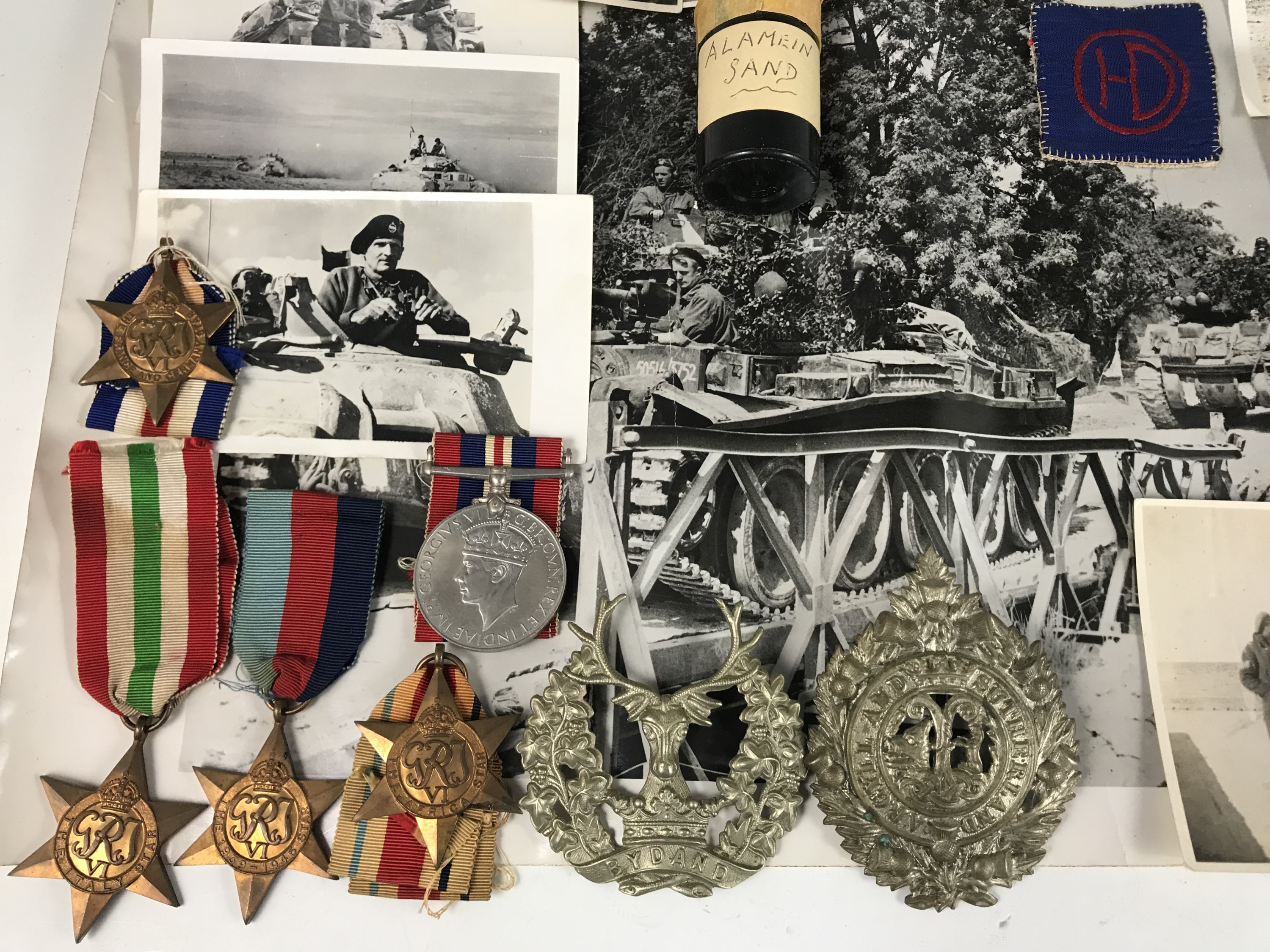 A Second World War campaign medal group, together with Highland Division formation sign, cap badges, - Image 2 of 2