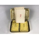 A First World War Princess Mary gift tin with original tobacco and other contents, and outer carton