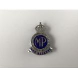 A Second World War MP War Reserve lapel badge