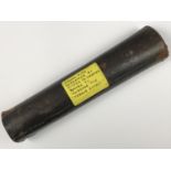 A cardboard tube bearing a label with inscription Organ pipe screamer as fitted to German bombs to