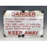 A Butterfly bomb enamel warning sign, 30 cm x 47 cm