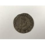 A Charles I hammered silver shilling coin, mint mark Plume (1630-1)