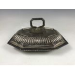 A Victorian silver vegetable tureen, having a raised and reeded border and gadrooned decoration,