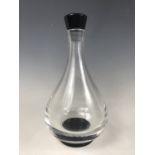 A 1930s Orrefors Art Deco black and clear glass decanter, of baluster form, having ground-in