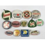 A number of vintage car and automotive related button and lapel badges, fobs etc