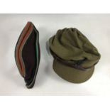 A Second World War ATS peaked cap together with a coloured Field Service cap