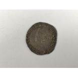 A Charles I hammered silver shilling coin, mint mark Tun (1636-8)