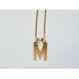 A 9ct gold initial 'M' pendant on a fine box-link neck chain, 3g