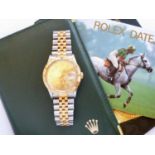A gentleman's Rolex Oyster Perpetual Datejust gold and stainless steel wrist watch, having a
