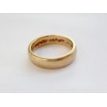 A 9ct gold wedding band, 6.6g