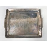 A Bohemian Modernist white-metal card tray by Frantisek Bibus, of Art Deco form, having a pair of
