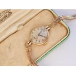 An early 20th Century lady's 9ct gold cased Cyma 'Shock Absorber' wristlet watch, having a