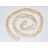 A vintage freshwater baroque pearl rope-necklace, being a single continuous strand of uniform