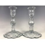 A pair of mid 18th Century facet-cut glass candlesticks, 20.5 cm