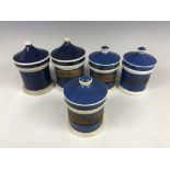 Five 19th Century pearlware blue and white chemist / apothecary jars, having gilded and hand-
