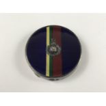 A George V Royal Marines silver powder compact having a guilloche enamelled cover in the unit