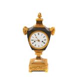 French gilt and bluing bronze Empire style table clock, 19th century