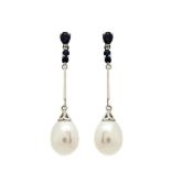 White gold, blue sapphires and pearl earrings