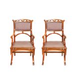 Spanish Modernist oak wood pair of armchairs, early 20th century