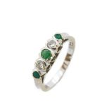 White gold, emeralds and diamonds ring