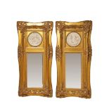 Carved and gilt wood "trumeau" style pair of mirrors