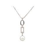 White gold, diamonds and cultured pearl pendant