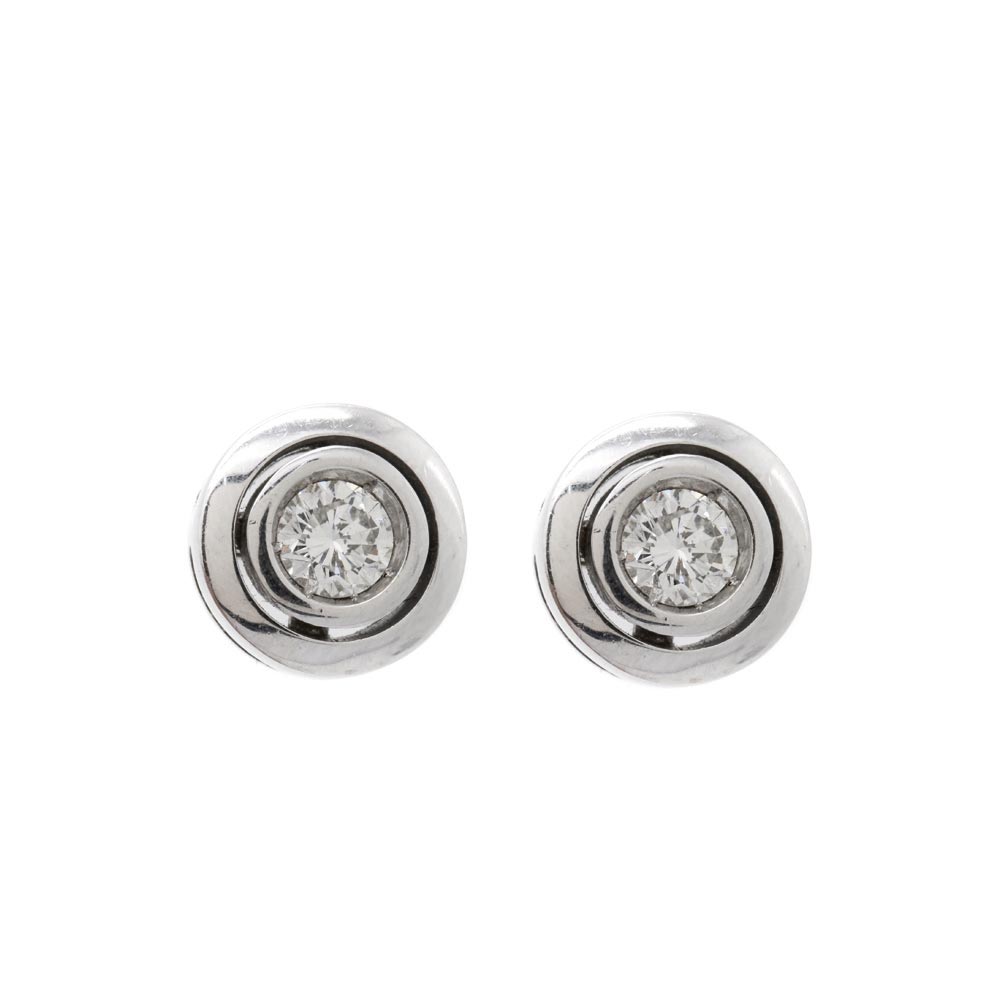 Pendientes en oro blanco con diamante talla brillante engastado en chatón. Peso diamantes: 0,90